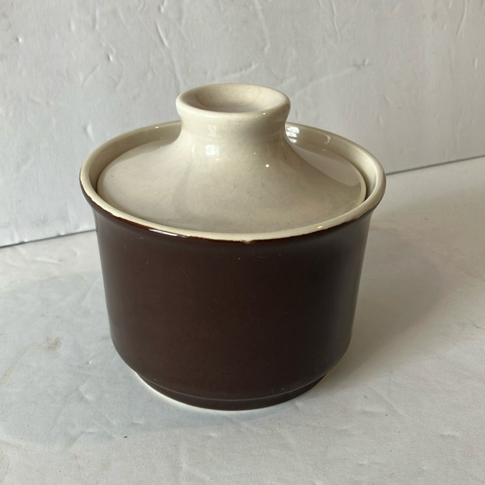 Preowned MCM brown and cream sugar bowl.